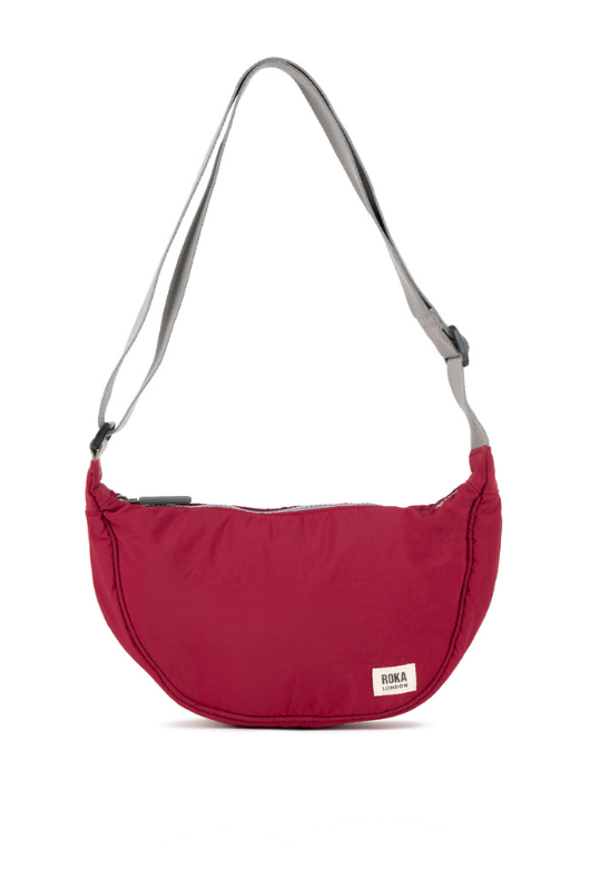 An image of the ROKA London Farringdon Crossbody in Berry.