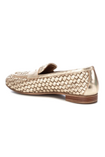 Carmela Loafer. A pair of gold moccasin shoes with interlocking design.