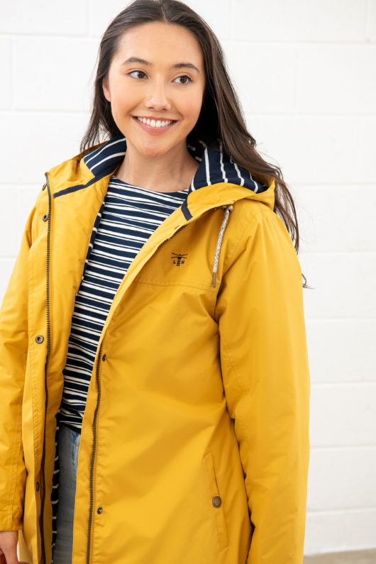 An image of the Lighthouse Eva Long Ladies Coat in Antique Gold.