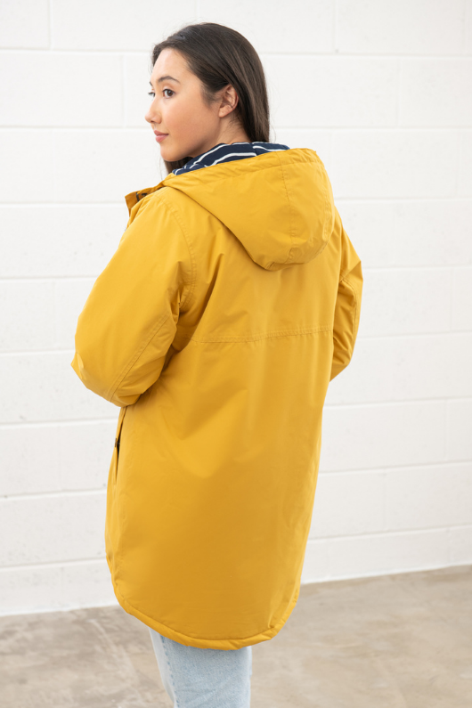 An image of the Lighthouse Eva Long Ladies Coat in Antique Gold.