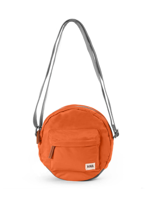 An image of the ROKA London Paddington B Crossbody in Burnt Orange.