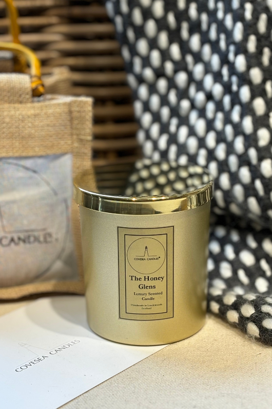 An image of the Covesea Candles Luxury Candle in the scent The Honey Glens.