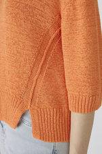 Oui Jumper. An orange, relaxed fit jumper with V-neck, 3/4 length sleeves, and slightly cropped length.