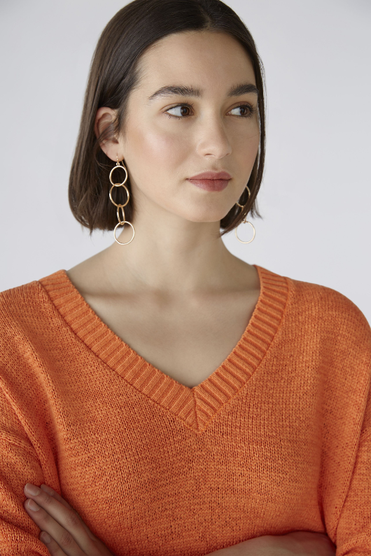 Oui Jumper. An orange, relaxed fit jumper with V-neck, 3/4 length sleeves, and slightly cropped length.