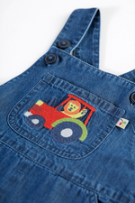 Frugi Carnkie Dungarees. A pair of blue denim dungarees with adjustable shoulder straps, elasticated waistband, and applique on the front pocket.