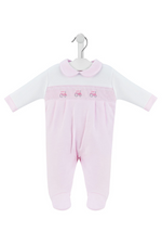 An image of the Dandelion Little Tractor Sleepsuit in Pink.