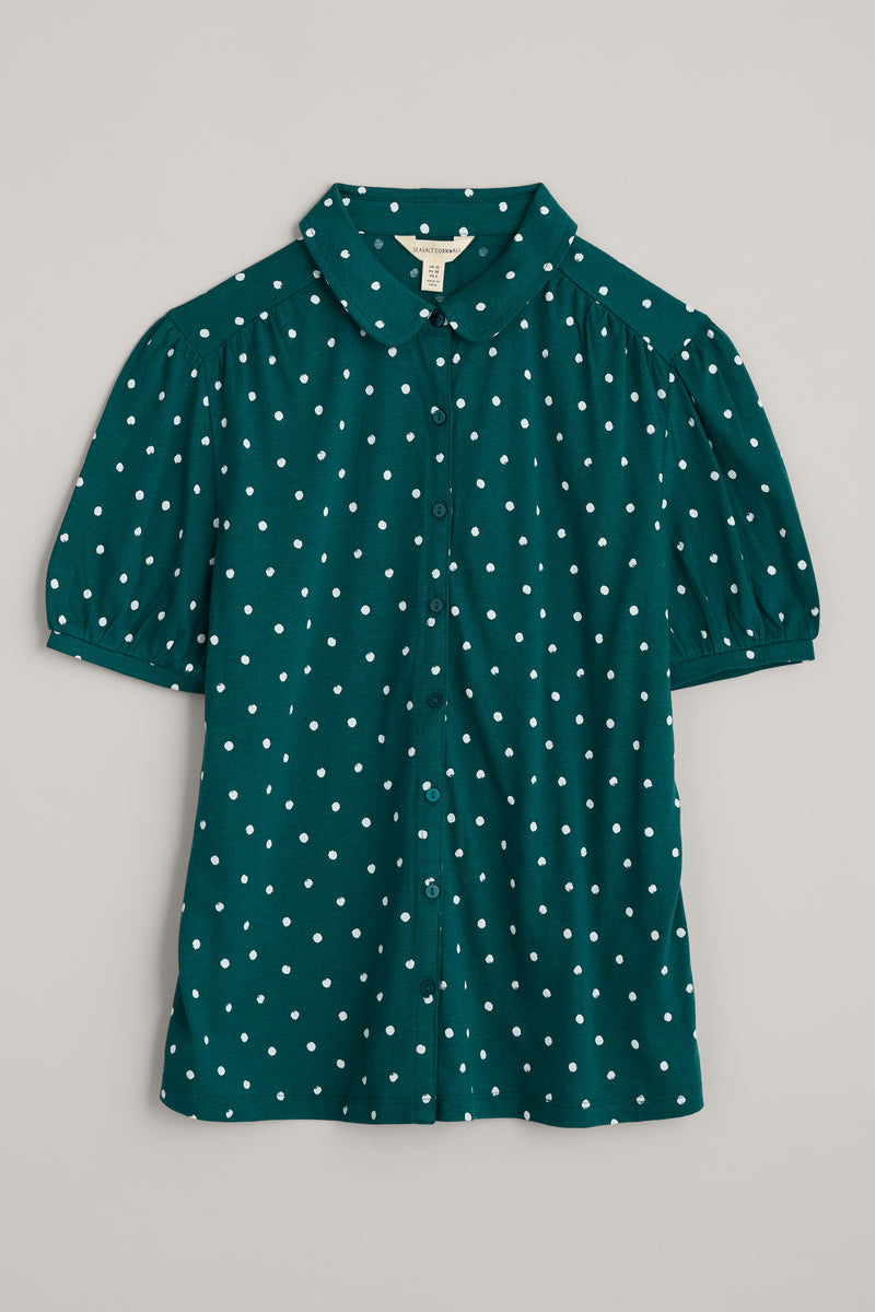 Seasalt Embrace Shirt. A green shirt with white polka dots, featuring a slightly fitted cut, collar, gathered short sleeves and button fastenings.