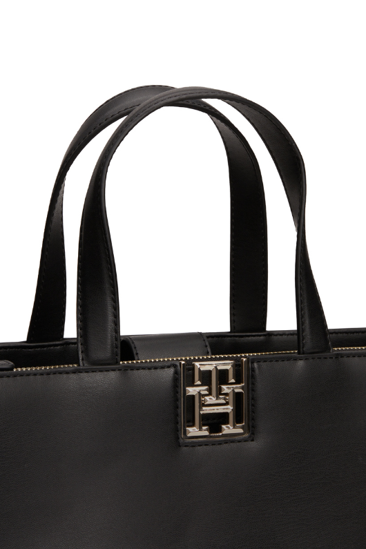 An image of the Tommy Hilfiger TH Monogram Removable Strap Satchel in Black.