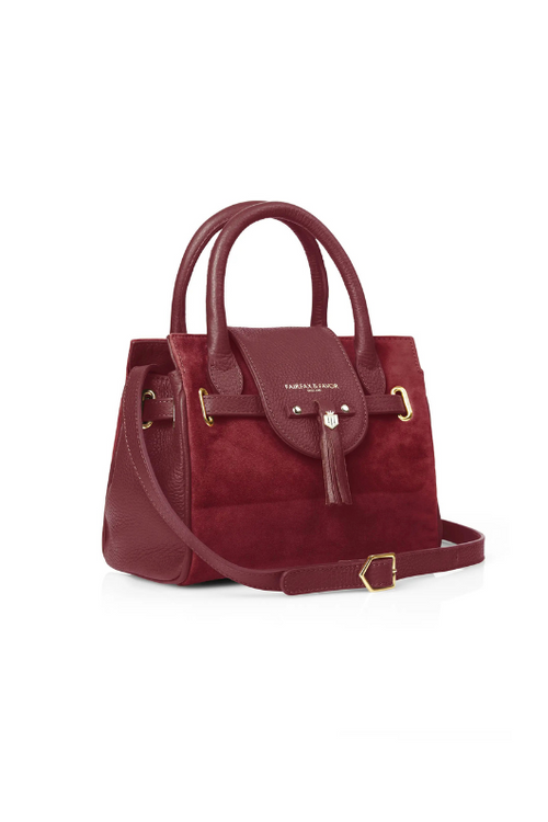 An Image of the Fairfax & Favor Mini Windsor Handbag in Ruby Suede.