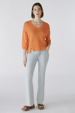 Oui Jumper. An orange, relaxed fit jumper with V-neck, 3/4 length sleeves, and slightly cropped length.