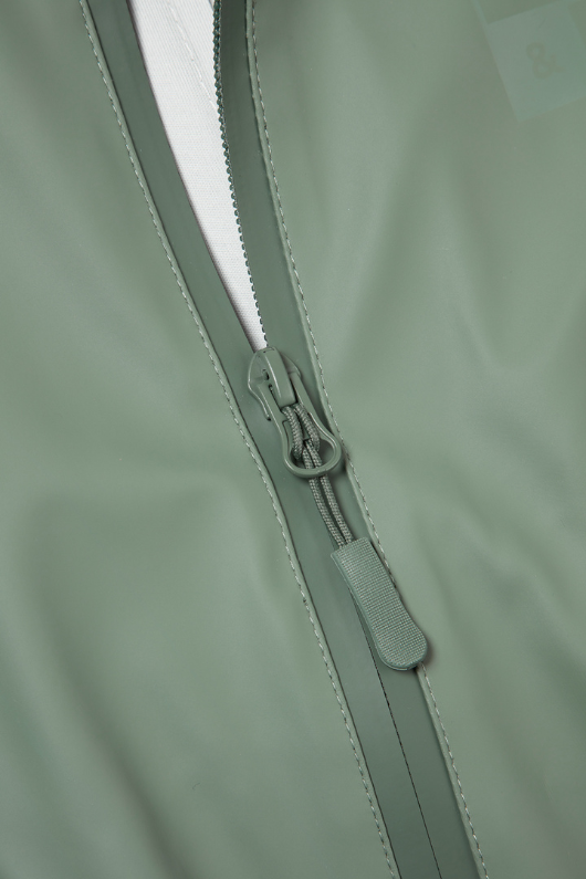 An image of the Grass & Air Puddle Suit in Khaki.