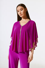 An image of a model wearing the Joseph Ribkoff Poncho Top in Empress.