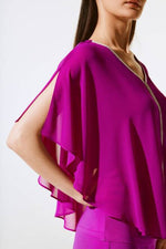 An image of a model wearing the Joseph Ribkoff Poncho Top in Empress.