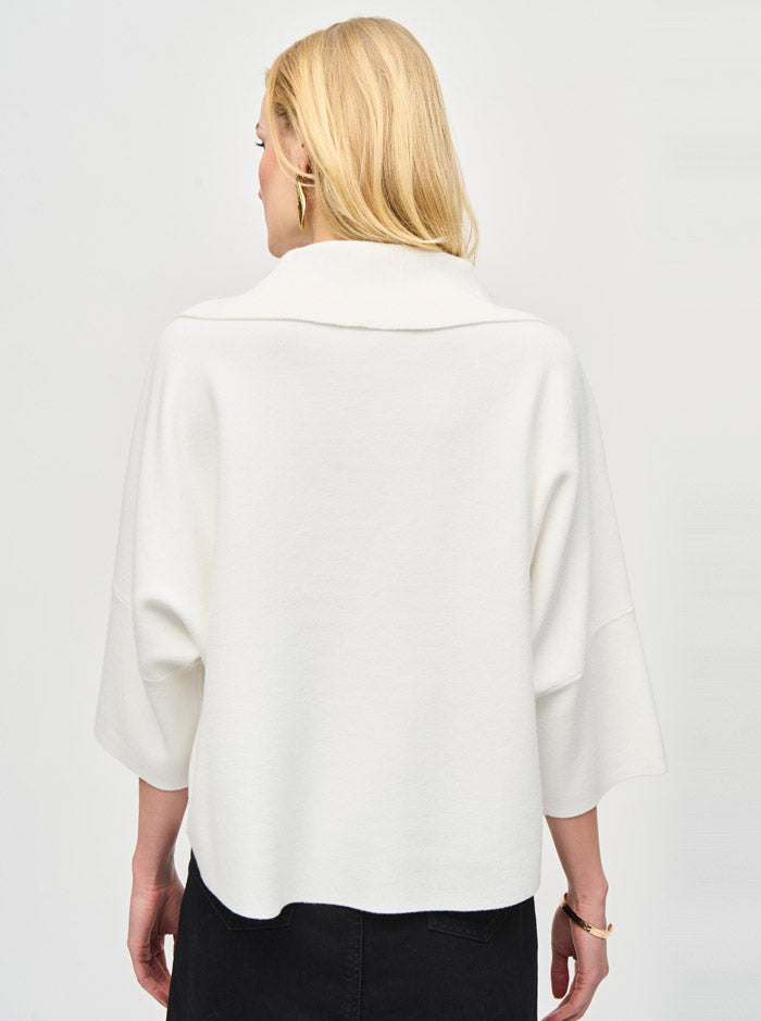 An image of a model wearing the Joseph Ribkoff Knit Top in Vanilla.