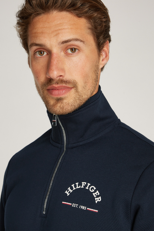 An image of the Tommy Hilfiger Roundall Stand Collar Jumper in Desert Sky.