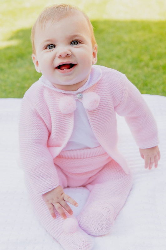 An image of the Dandelion Knitted Pom Pom Top & Trousers in Pink.