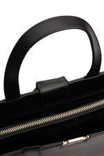 An image of the Tommy Hilfiger TH Monogram Removable Strap Satchel in Black.