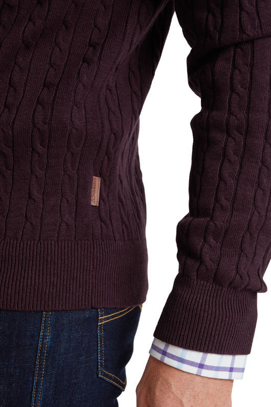 An image of the Schoffel Calton Cotton Cashmere Cable 1/4 Zip Jumper in Wine.