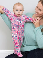 An image of the Kite Pig Pannage Sleepsuit in Pink.