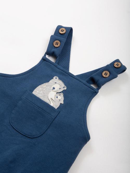 An image of the Kite Snuggle Bear Dungarees in Navy.