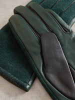 An image of the White Stuff Lucie Leather Gloves in Dark Green.