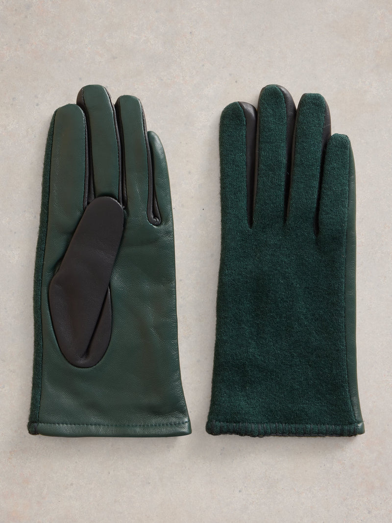 An image of the White Stuff Lucie Leather Gloves in Dark Green.