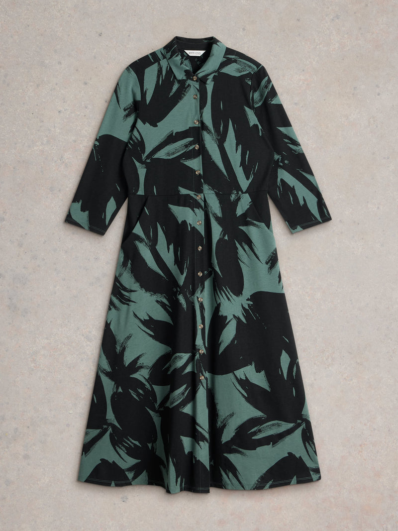 An image of the White Stuff Rua Jersey Shirt Dress in Green Print.