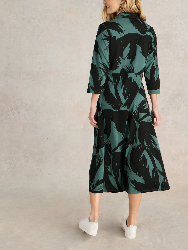 An image of the White Stuff Rua Jersey Shirt Dress in Green Print.