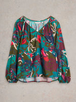 An image of the White Stuff Imogen Top in Green Print.