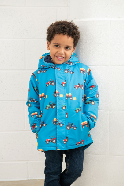 An image of the Lighthouse Finlay Boys Coat in Farm Print.