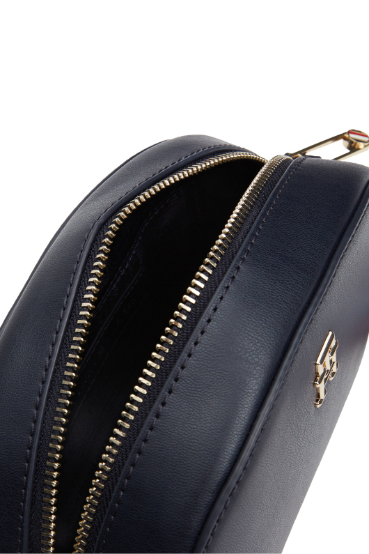 An image of the Tommy Hilfiger Corporate Webbing Logo Strap Camera Bag in Space Blue.