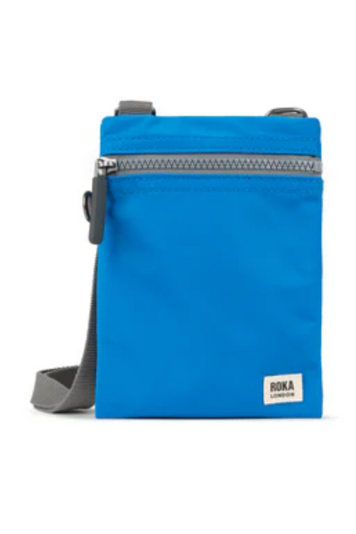 An image of the ROKA London Chelsea Crossbody in Neon Blue.