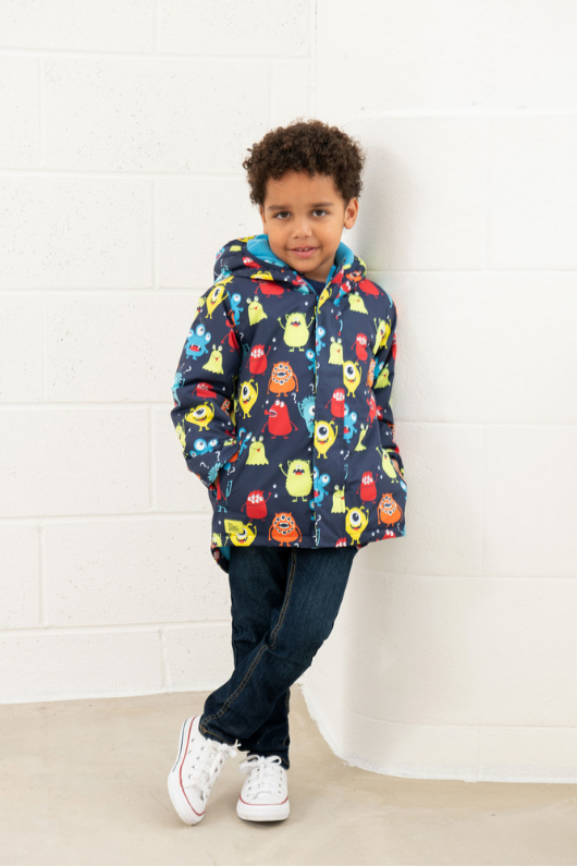 An image of the Lighthouse Finlay Boys Coat in Monster Print.