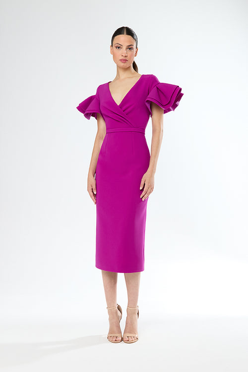 An image of the Carla Ruiz Ruffle Sleeve Dress in Fuchsia.