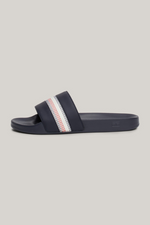 An image of the Tommy Hilfiger Global Stripe Topstitch Pool Slides in Space Blue.