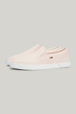 An image of the Tommy Hilfiger Enamel Flag Slip-On Canvas Trainers in the colour Whimsy Pink.