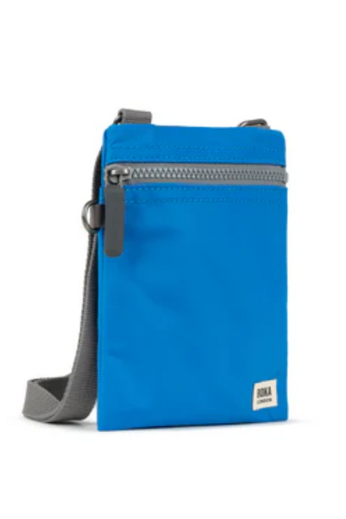 An image of the ROKA London Chelsea Crossbody in Neon Blue.