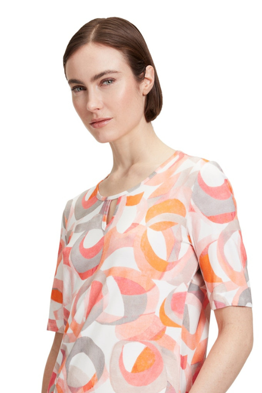 An image of a female model wearing the Betty Barclay Half Sleeve Top in the colour Rose Cream.