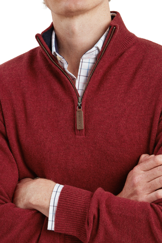 An image of the Schoffel Lewis Lambswool 1/4 Zip Jumper in Deep Red.