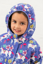 An image of the Lighthouse Freya Girls Coat in Horse Print.