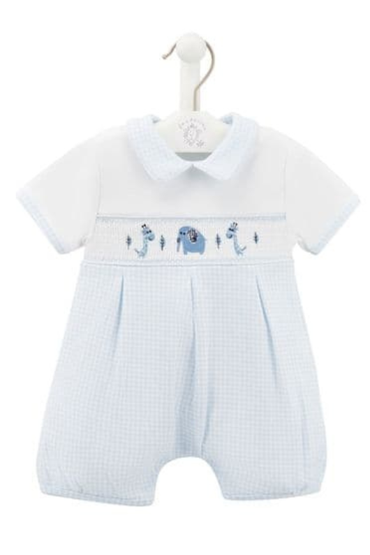 An image of the Dandelion Jungle Friends Smocked Romper in Sky.