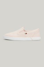 An image of the Tommy Hilfiger Enamel Flag Slip-On Canvas Trainers in the colour Whimsy Pink.