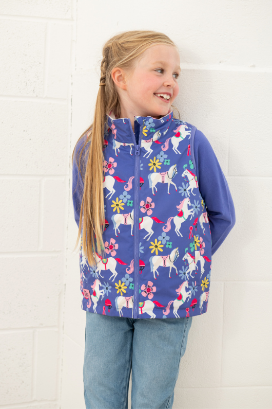 An image of the Lighthouse Alex Gilet in Horse Print.