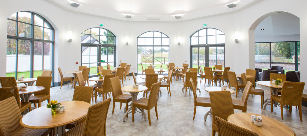 An image of the Brodie Countryfare Family Restaurant seating area. The outdoor seating area can also be seen, which is dog friendly.