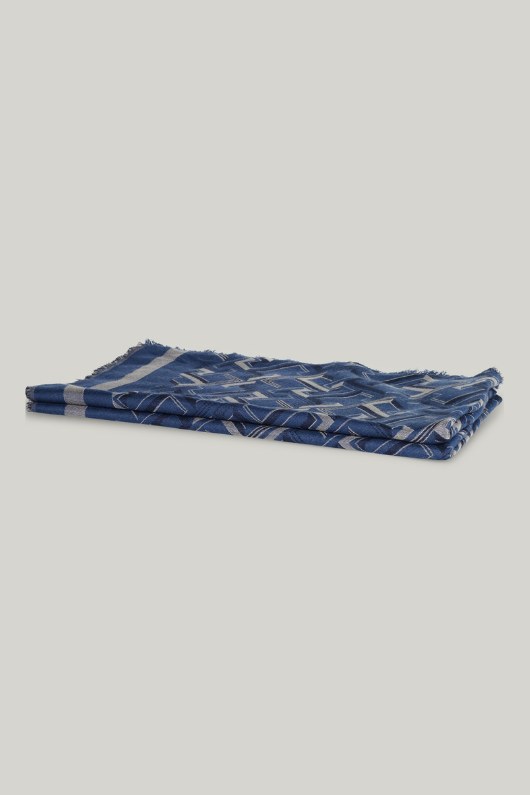 An image of the Tommy Hilfiger TH Monogram Jacquard Scarf in Fossil Blue.