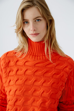 An image of the Oui Cable Knit Jumper in Cherry Tomato.