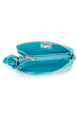 Kipling Creativity Small Purse. A small aqua purse with zipper compartment, multiple inner compartments, Kipling logo, and monkey charm.