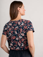 An image of the Seasalt Appletree T-Shirt in Seaweed Swirl Maritime.