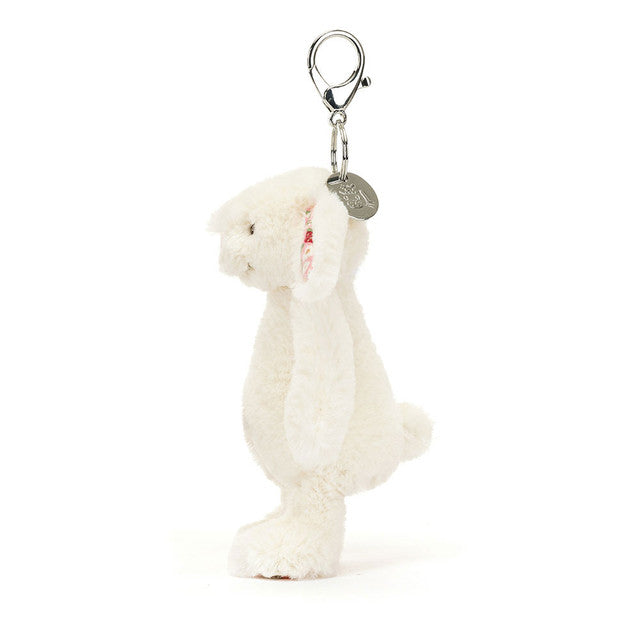 An image of the Jellycat Jellycat Blossom Cream Bunny 'Berry' Bag Charm