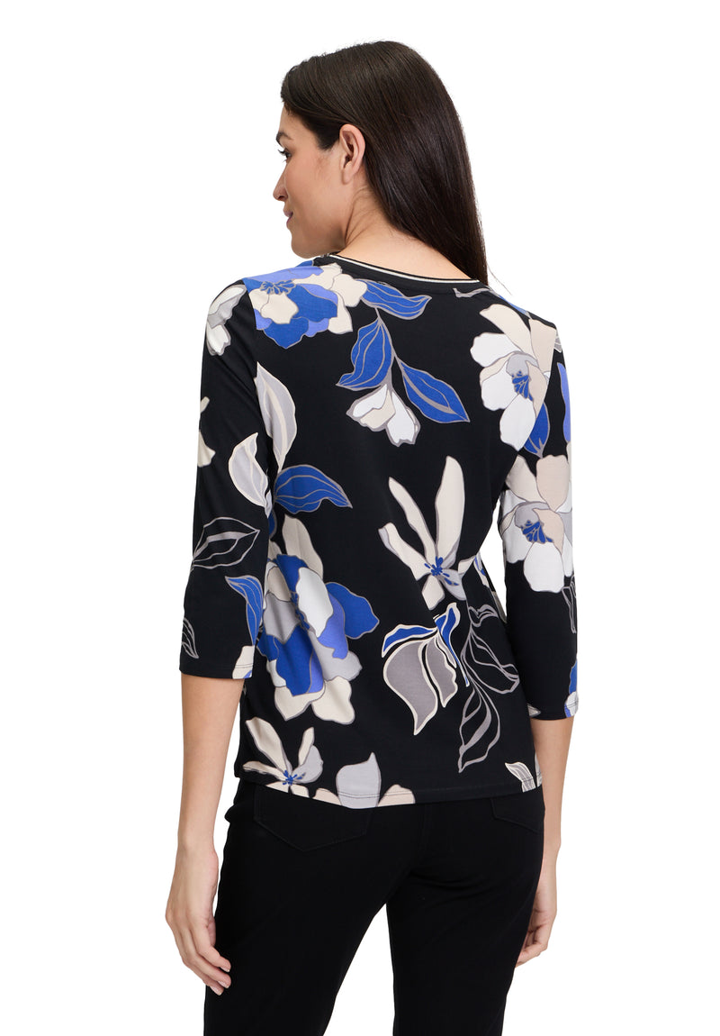 An image of the Betty Barclay Floral Top in Black/Blue.